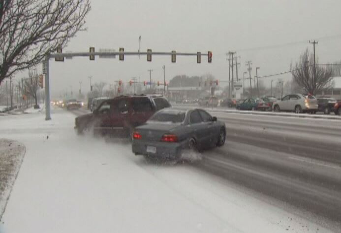 Caught on video_ Out of control SUV crashes in snow, nearly hits TV crew in Va. (Image 1)_52974