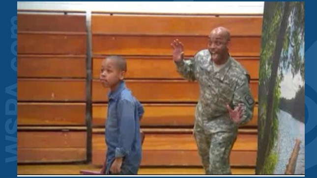 NC dad back in US surprises son with school picture 'photobomb' (Image 1)_56569