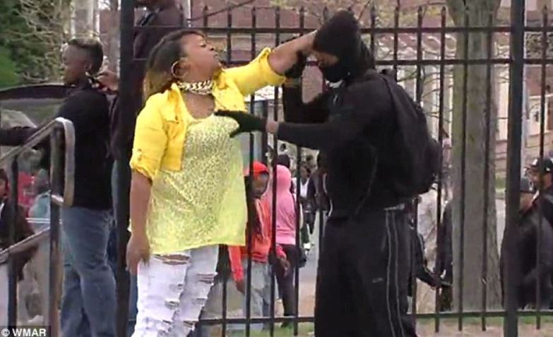 Mom beats son after seeing him in the Baltimore riots, video shows (Image 1)_57058