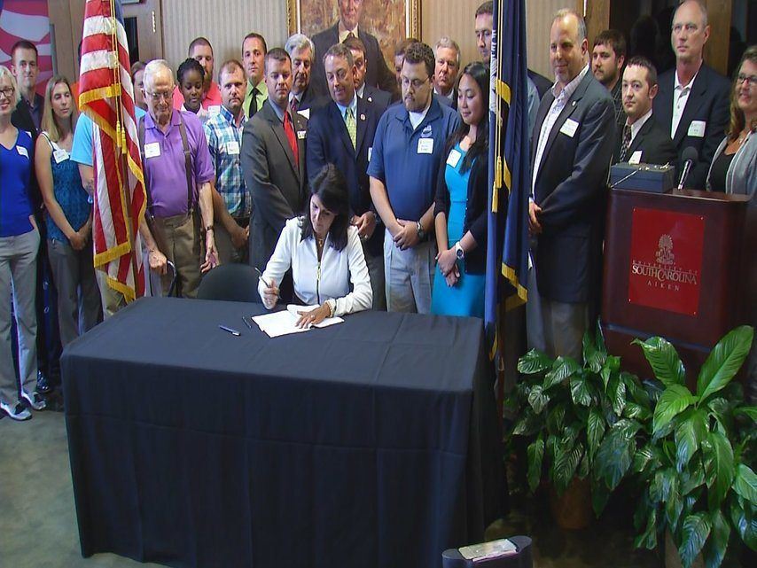 Gov. Haley signs law giving all veterans in-state tuition in SC (Image 1)_59813