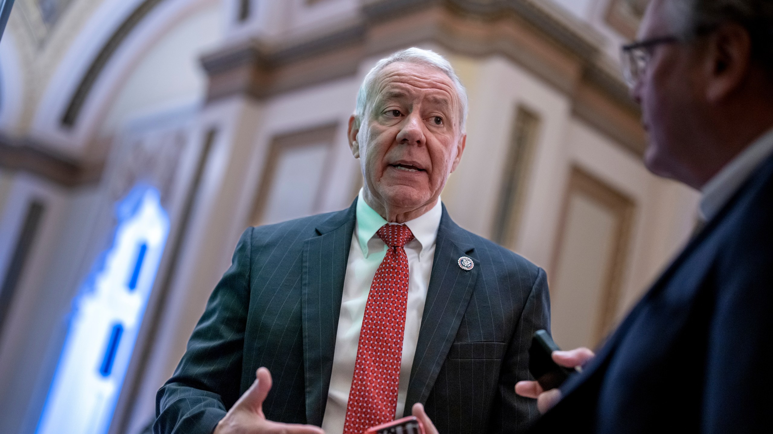 FILE - Rep. Ken Buck, R-Colo., a member of the conservative House Freedom Caucus, stops to speak with a reporter, Dec. 2, 2022, at the Capitol in Washington. Buck, a conservative Republican who represents much of Colorado's rural eastern plains, announced Wednesday, Nov. 1, 2023, that he would not seek a sixth term in Congress, citing many in his party who refuse to accept the results of the 2020 presidential election and to condemn the Jan. 6, 2021, attack on the Capitol. (AP Photo/J. Scott Applewhite, File)