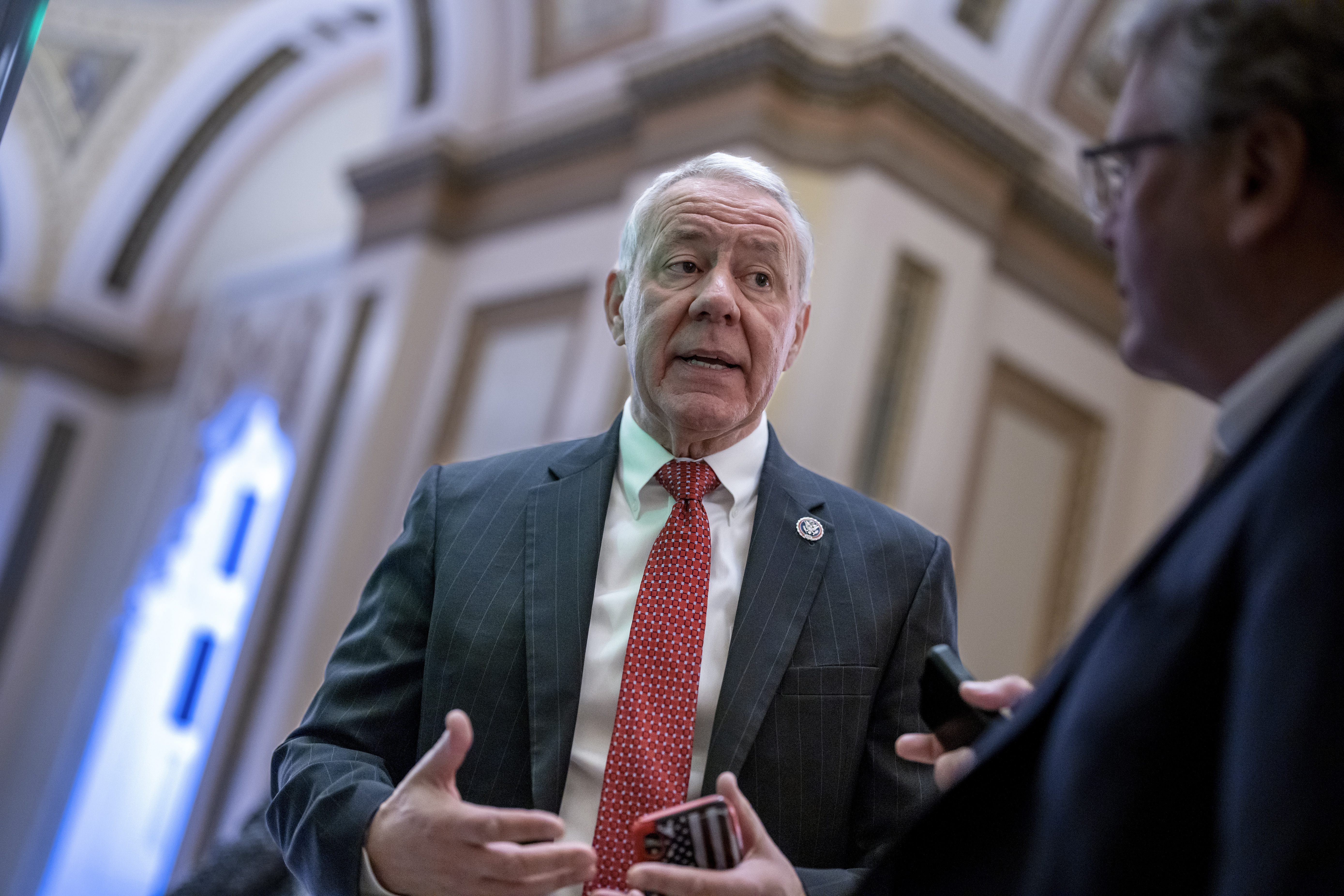 FILE - Rep. Ken Buck, R-Colo., a member of the conservative House Freedom Caucus, stops to speak with a reporter, Dec. 2, 2022, at the Capitol in Washington. Buck, a conservative Republican who represents much of Colorado's rural eastern plains, announced Wednesday, Nov. 1, 2023, that he would not seek a sixth term in Congress, citing many in his party who refuse to accept the results of the 2020 presidential election and to condemn the Jan. 6, 2021, attack on the Capitol. (AP Photo/J. Scott Applewhite, File)