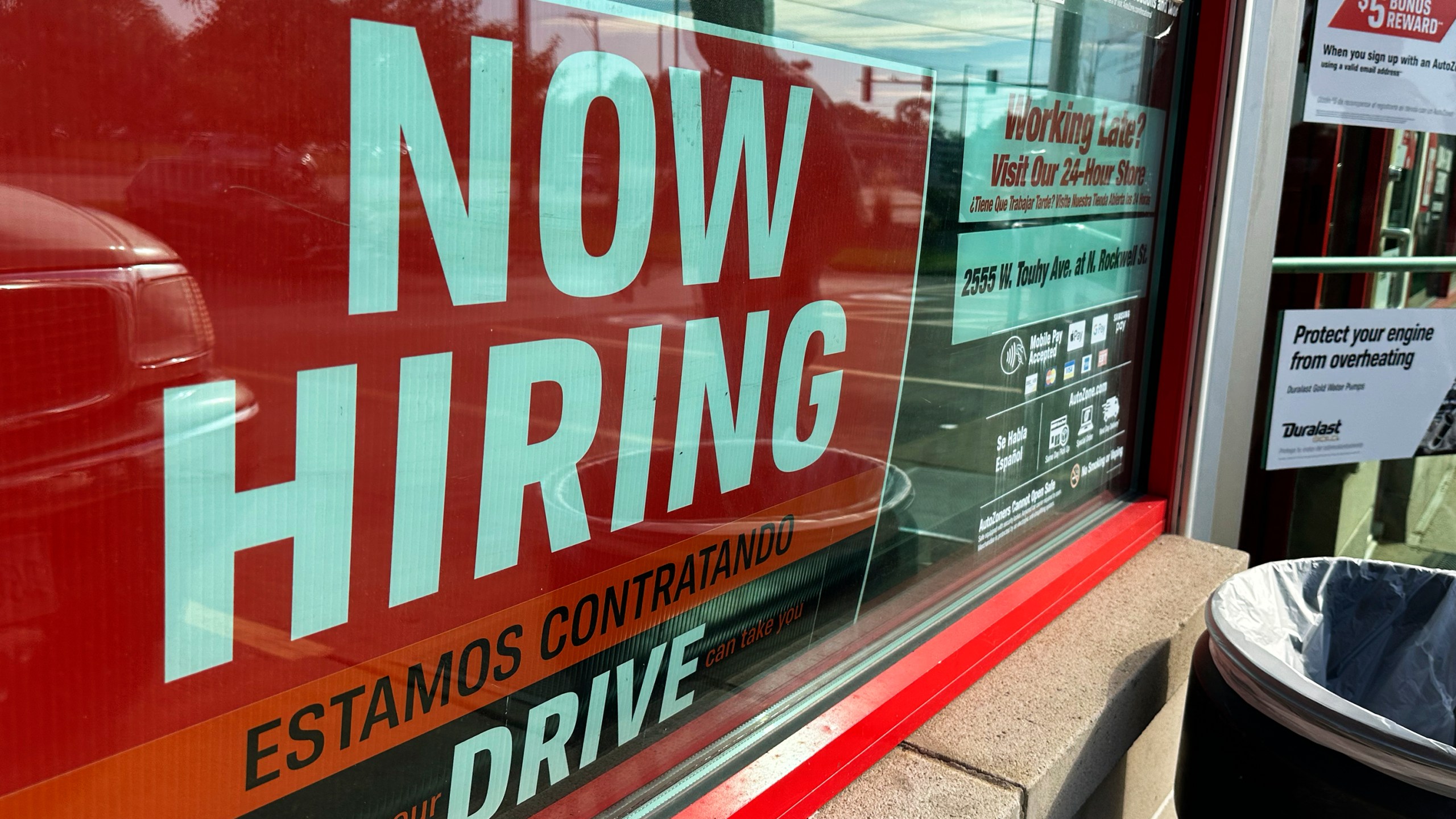 A hiring sign is displayed at a retail store in Wheeling, Ill., Sunday, Sept. 24, 2023. On Thursday, the Labor Department reports on the number of people who applied for unemployment benefits last week. (AP Photo/Nam Y. Huh)