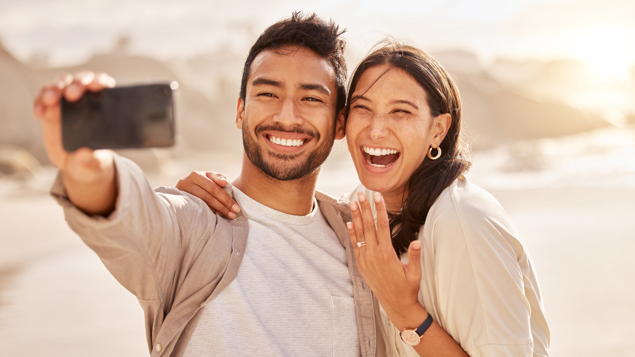 Engaged couple outdoors