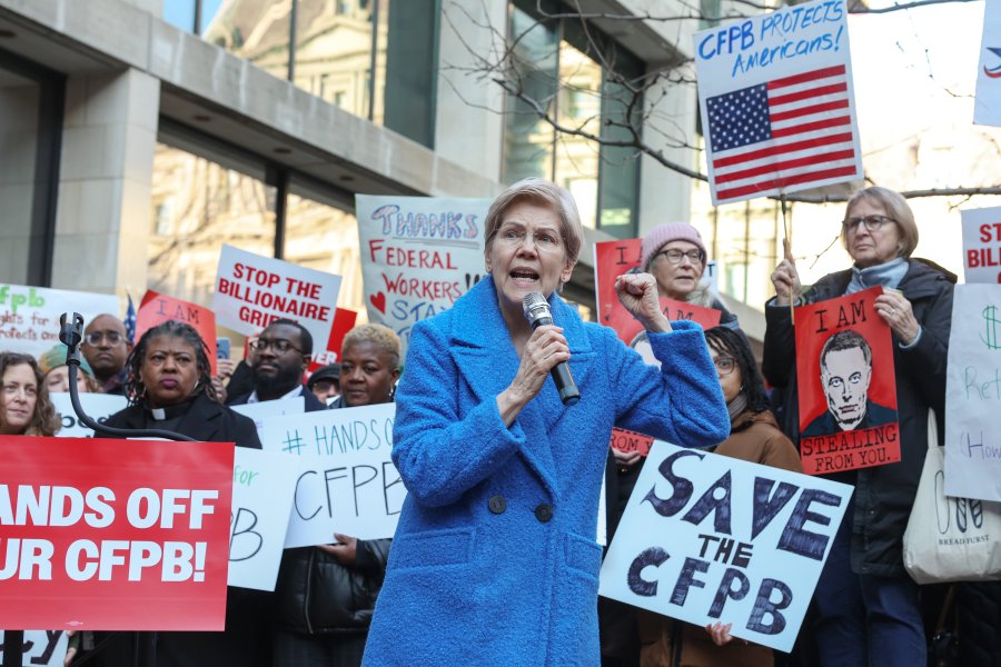 WASHINGTON, DC - FEBRUARY 10:  U.S. Sen. Elizabeth Warren (D-MA) speaks as Congressional Democrats and CFPB workers hold a rally to protest the closing of the Consumer Financial Protection Bureau (CFPB) and the work-from-home order issued by CFPB Director Russell Vought outside its headquarters on February 10, 2025 in Washington, DC. (Photo by Jemal Countess/Getty Images for MoveOn)